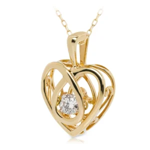 Złota zawieszka serce 585 z tańczącym diamentem 0,11ct