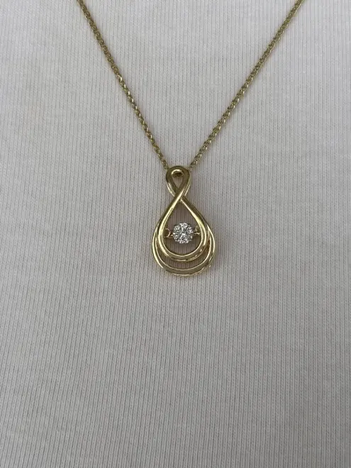 Złota zawieszka 585 z tańczącym diamentem 0,03ct - obrazek 2